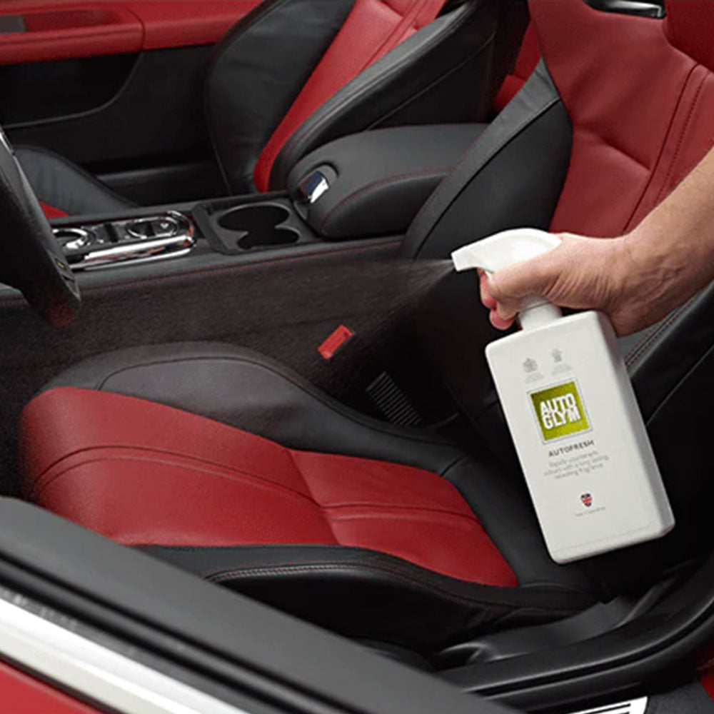 spraying Autoglym Autofresh inside car