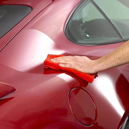 buffing Autoglym Extra Gloss Protection on to car
