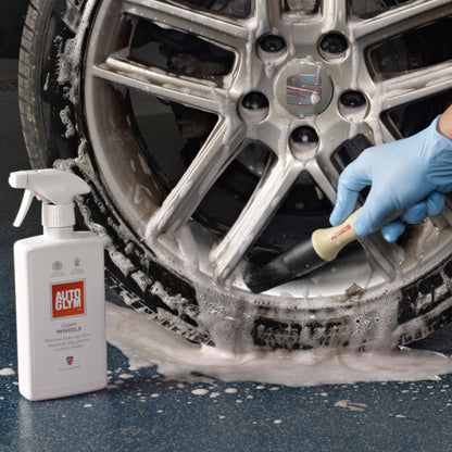 brushing car wheel with Autoglym Hi Tech Wheel Brush and clean wheels