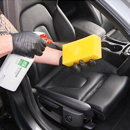 Applying Autoglym Interior Cleaner to sponge