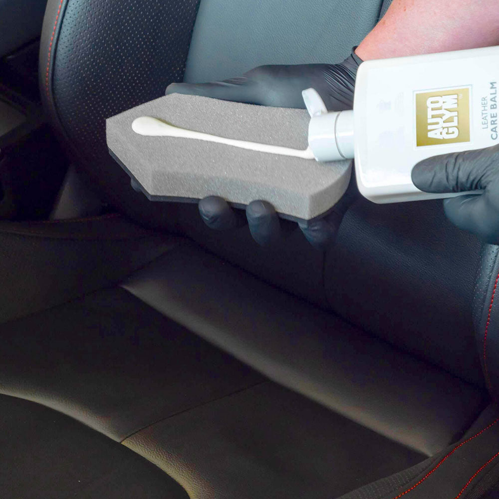 applying Autoglym Leather Care Balm to sponge