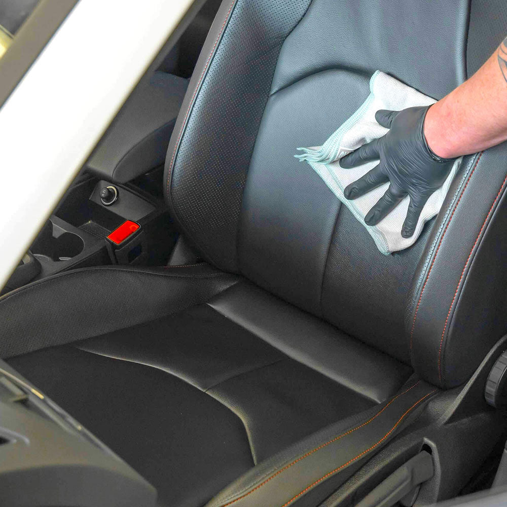applying Autoglym Leather Care Balm to car seat