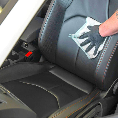 applying Autoglym Leather Care Balm to car seat