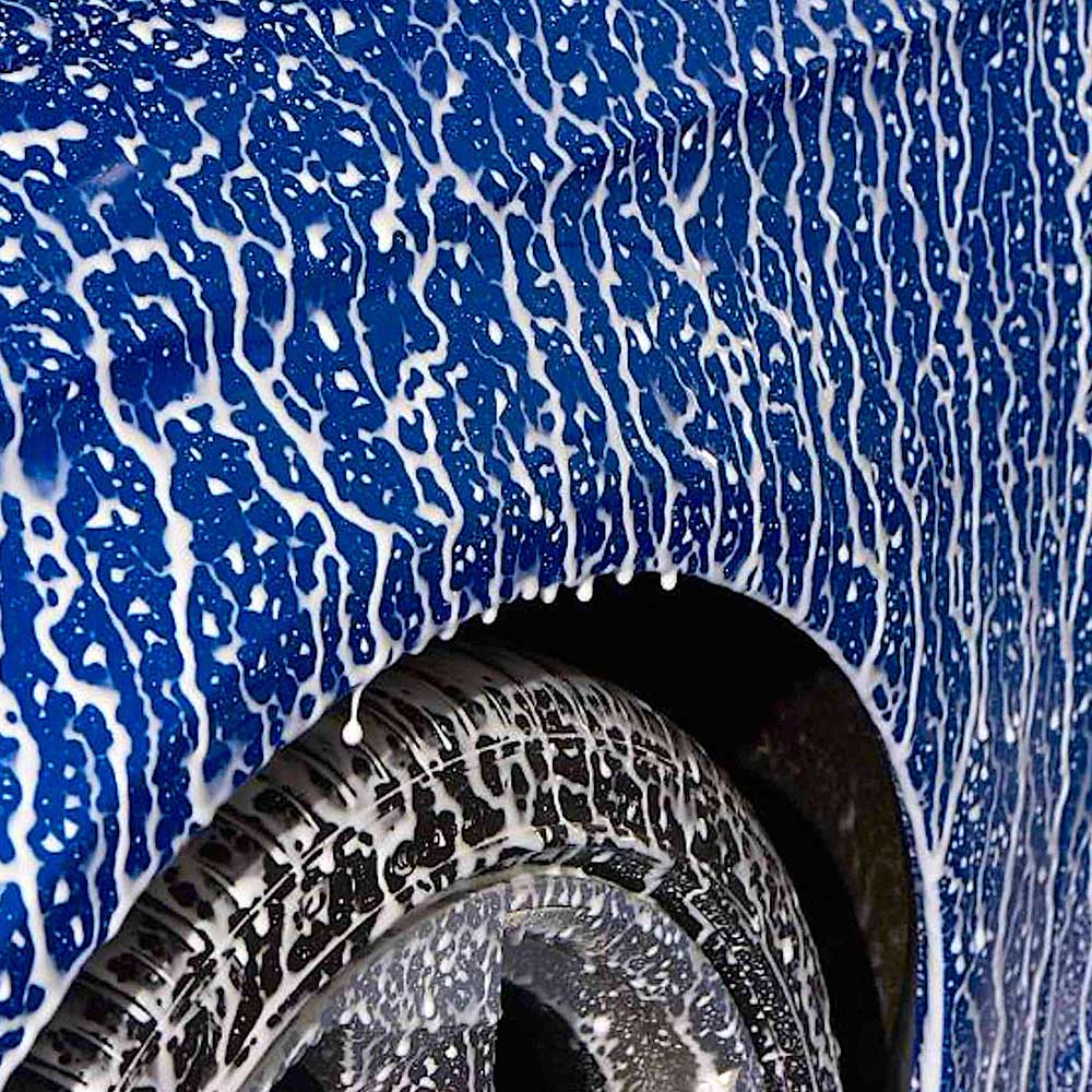 close up Autoglym Polar Seal dripping on car exterior