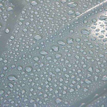close up water beading on car body