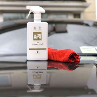 Autoglym Rapid Ceramic Spray sitting on vehicle bonnet with soft cloth