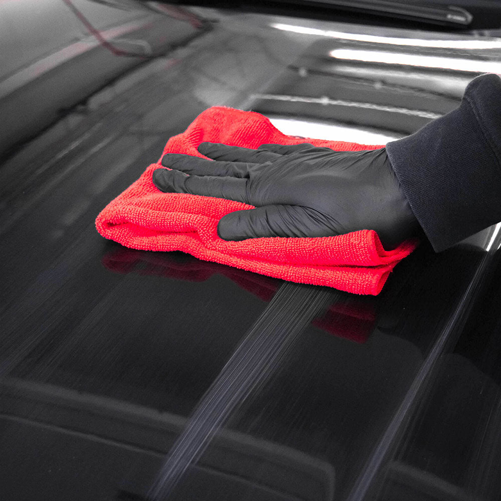 wiping Autoglym Super Resin Polish with microfibre cloth