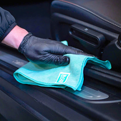 polishing car interior with soft cloth and Autoglym Vinyl Rubber Care