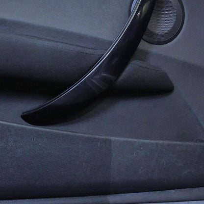 before and after using Autoglym Vinyl Rubber Care on inside car door