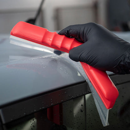 close up of Autoglym Water Blade flexing around car body