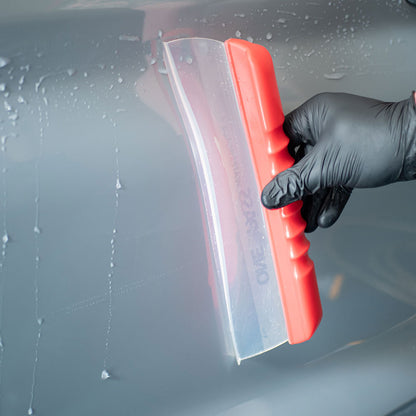 close up of Autoglym Water Blade scraping water off car