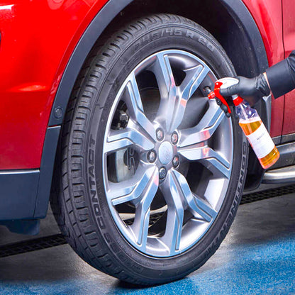 spraying Autoglym Acid Wheel Cleaner on wheel