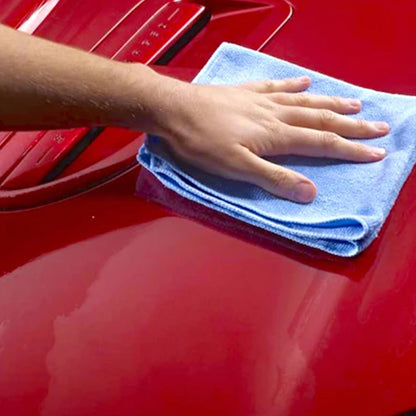 polishing car with microfibre cloth