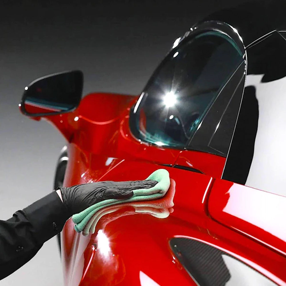 buffing Autoglym Ultra High Definition Ceramic Coating on vehicle body