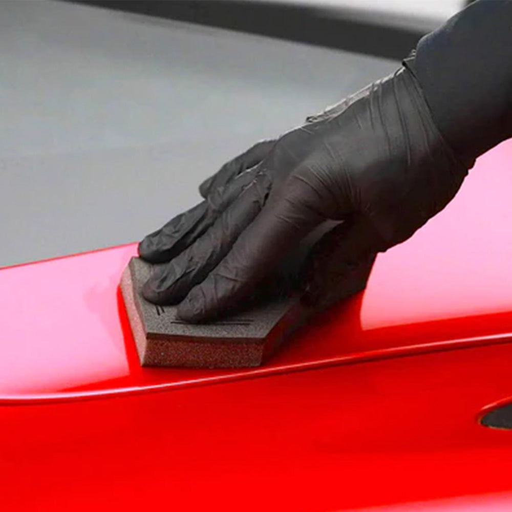 applying buffing Autoglym Ultra High Definition Ceramic Coating with sponge