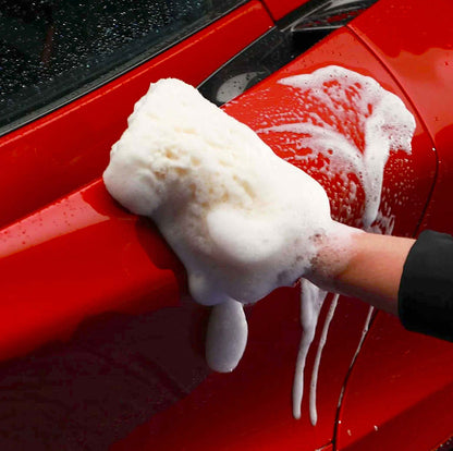 cleaning car with sponge and Autoglym Ultra High Definition Shampoo