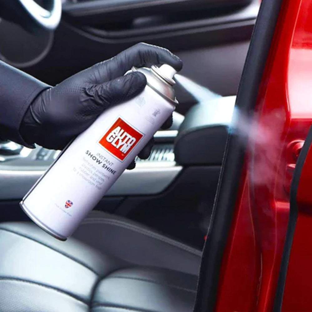 spraying Autoglym Instant Show Shine on car door paintwork