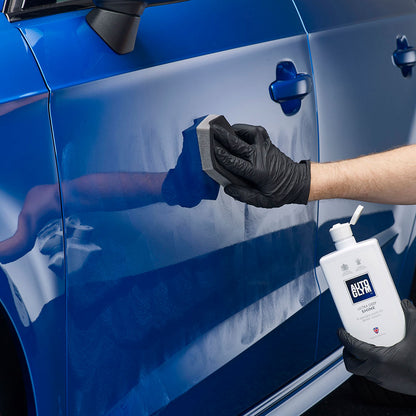 applying autoglym ultra deep shine to car body with sponge