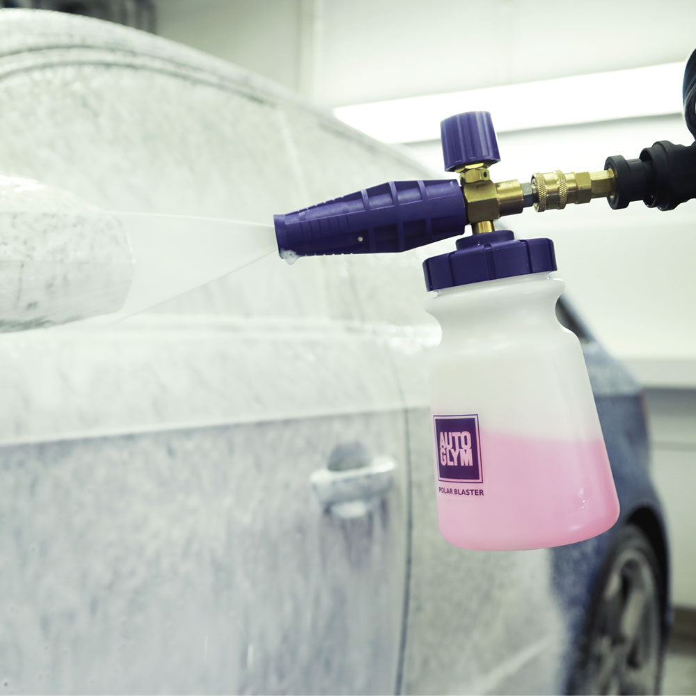 close up spray polar wash onto car