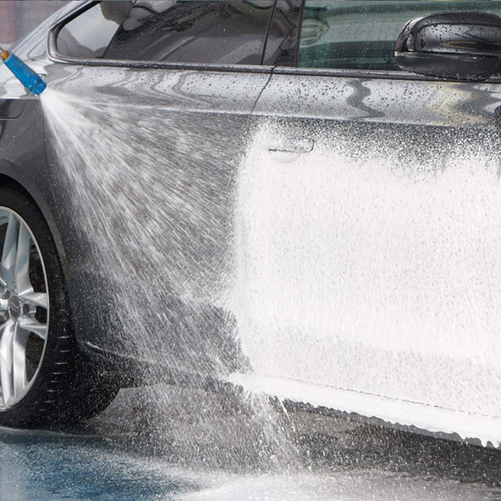 washing foaming tfr cleaner off car with hose