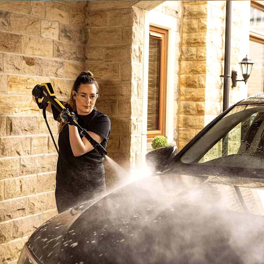 spraying car with water