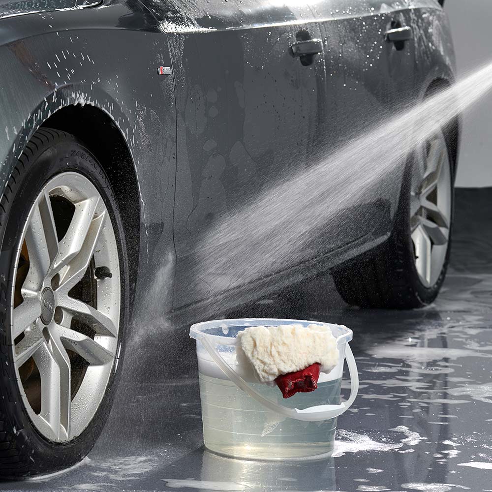 hosing down car after cleaning