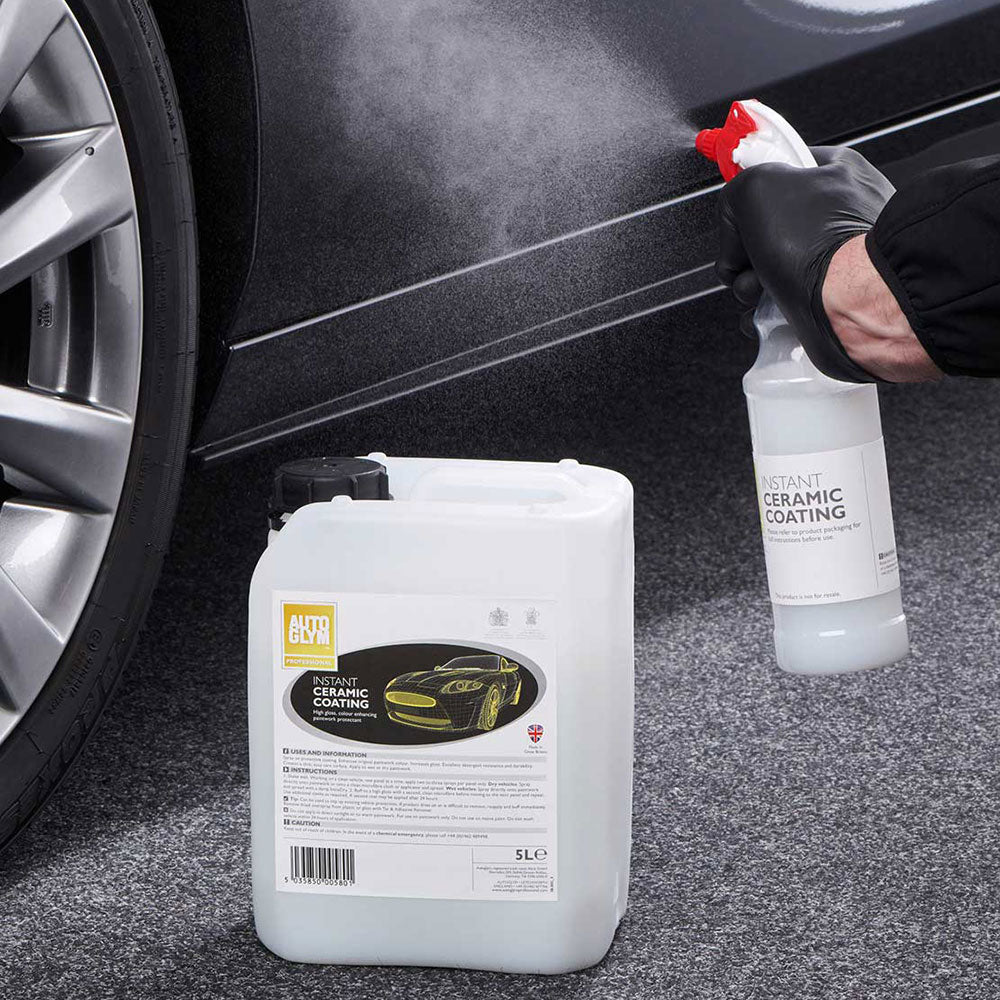 spraying autoglym instant ceramic coating on car exterior