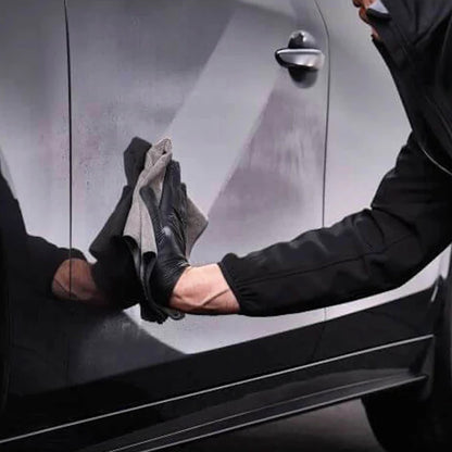 wiping autoglym instant ceramic coating on car exterior