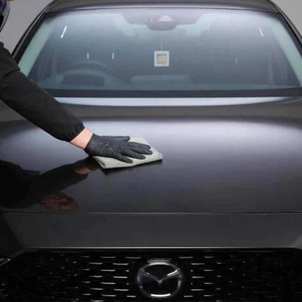 polishing autoglym instant ceramic coating on car exterior